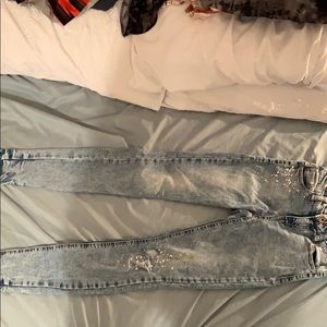 Ripped/ jeweled jeans